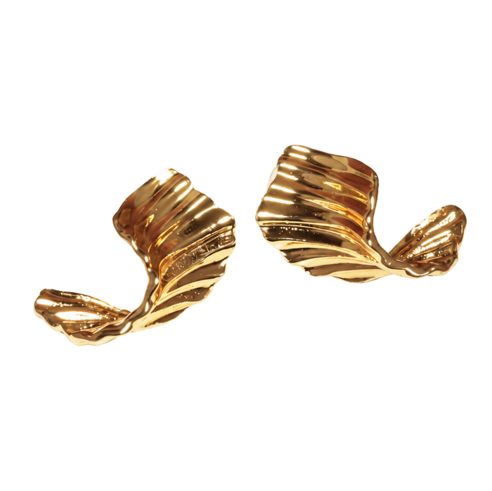 A pair of gold-toned, textured leaf-shaped stud earrings on a plain white background.