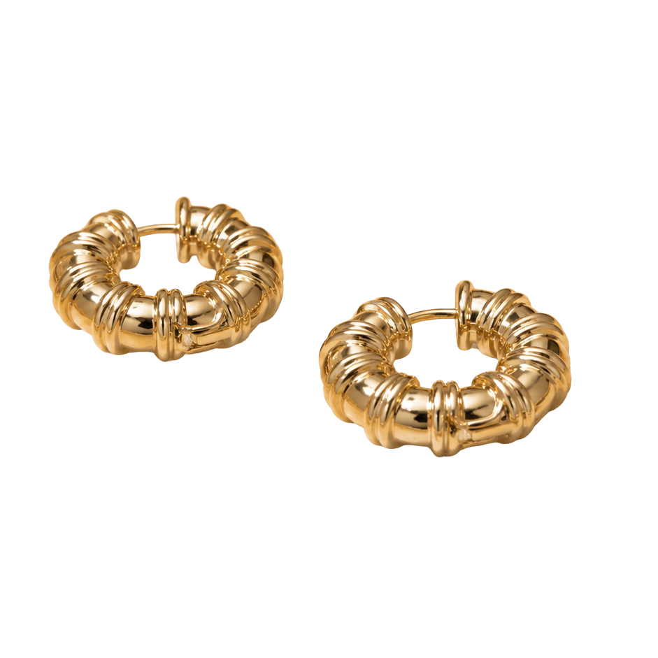 A pair of gold hoop earrings with a textured, ribbed outer design and a smooth inner band, displayed on a solid white background.