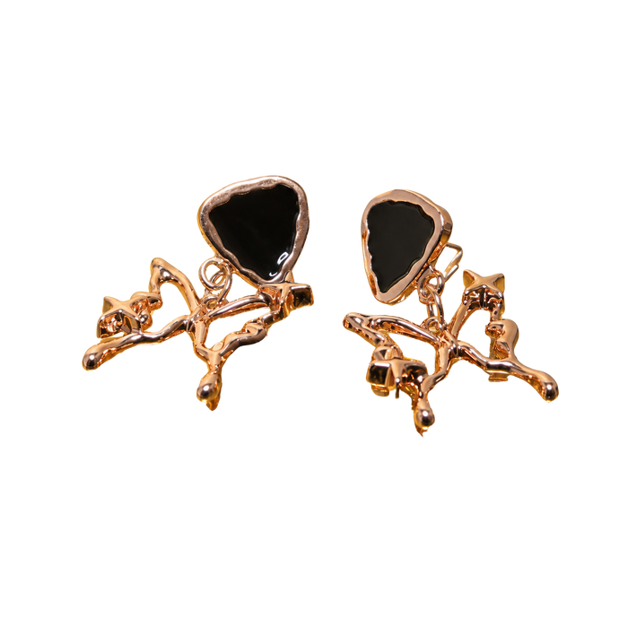 A pair of rose gold earrings featuring a polished triangular black stone inlay, set within an organic, branch-like rose gold metal design, shown against a plain white background.